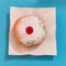 Top view closeup of a Hanukkah mocks sufganiyah doughnut