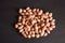 Top View of Closeup Peanuts-Groundnut On isolated Black Background