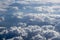 Top view of the clouds, the movement of air masses. Concept: God`s view of the earth, the view from the plane window.