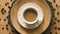 Top view of coffee with milk on decorative plate on wooden table