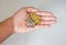 Top view coins in hands with background