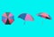 Top view, Collection set of rainbow umbrella isolated on cyan background for stock photo or design, invesment, business, summer