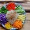 Top view colorful plate of food, vegan mixed vermicelli with vegetables