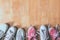 Top view of Colorful sneakers on the wooden table background.