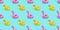 Top view colourful pink flamingo,yellow duck toys vibrant colors seamless pattern on light pastel blue background. Flat lay illust