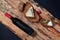 Top view of composed bread slices with blue cheese and grapes on wooden planks with bottle of wine