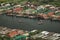 Top view of congested houseboats, shikara, boats, and houses in blue waters of Dal Lake. Jammu and Kashmir, India