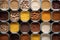 Top view of containers filled with a variety of grains and legumes. The organization and storage in a kitchen in containers