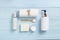Top view of Cosmetic Spa products on blue wood background.