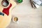 Top view of cosy home scene. Guitar, books, cup of coffee and succulent plants over wooden background. Copy space