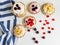 Top view of crispbread, cottage cheese and fruit dessert