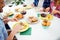 Top view cropped portrait of festive relatives imposing food in