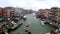Top View of the crowd of people standing on the Rialto Bridge. Venice, Italy Grand Canal