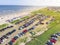 Top view crowed parking lot and sandy Galveston beach, Texas summer time