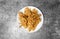 Top view Crunchy fried Enoki Mushroom on the grey concrete table