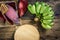 Top view Cultivated banana and banana blossom on the table.