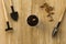 Top view of cup with soil dates fruit and bones for planting palm on the wooden background