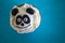 Top view of a cupcake decorated with a panda