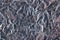 Top view of dark silvery foil background texture