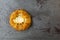 Top view of a delicious cream cheese danish on a gray mottled tabletop