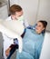 Top view of dentist with patient in dental ambulant