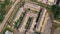 Top view of a deserted shabby buildings in industrial zone.