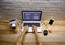 Top view of doctor radiologist dentist hands typing on keyboard of laptop with panoramic dental x-ray while sitting at table with