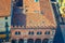 Top view of Domus Mercatorum house medieval building with merlons and red tiled roof