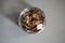 Top view of dried cucumber slices in a jar on the table