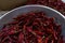 Top view of dried red chilies isolated on basket