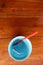 Top view, drinking water and ice put in plastic glasses with straws placed on wooden table, selectable focus, Copy Space.