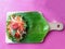 Top view of empty banana leaf with vegetable shaped like a rose