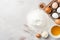 Top View of Essential Baking Ingredients on Counter, Copy Space