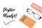 Top view of eyeglasses, calculator and colored paper over white background written with POSITIVE MINDSET