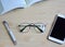 Top view Eyeglasses on wood table.