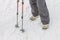 Top view of feet in boots and gaiters snow protection in the snow.