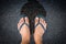 Top view feet in sandals selfie shot of asian men legs with wet