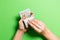 Top view of female hands counting money. One hundred and twenty dollar banknotes on colorful background. Salary concept. Bribe