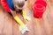 Top view of female housemaid cleaning the parquet