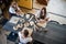 Top view of female potters during the working process in the clay workshop. Woman masters prepare ceramic and clay