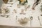 Top view of festive tables setting with wine glasses, and fresh flowers