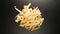 TOP VIEW: Fettuccine pastas on a black table