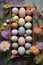 top view of a flat lay arrangement of pastel-colored easter eggs