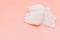 Top view flat lay cleansing wet wipes to remove makeup and clean the skin on orange background with copy space, White wet tissue