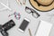 Top view Flat lay, Woman`s travel and vacation concept items. Top view with copy space, camera, glasses, smartphone, cosmetic and