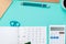Top view flat lay of workspace desk styled design office supplies with calendar