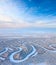 Top view of forest river in winter