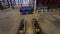 Top view of forklift truck going to load boxes with metal billets. Pallet truck