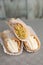 Top view of four delicious cannoli on wooden background