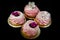 top view on four handmade pink zephyr cookies